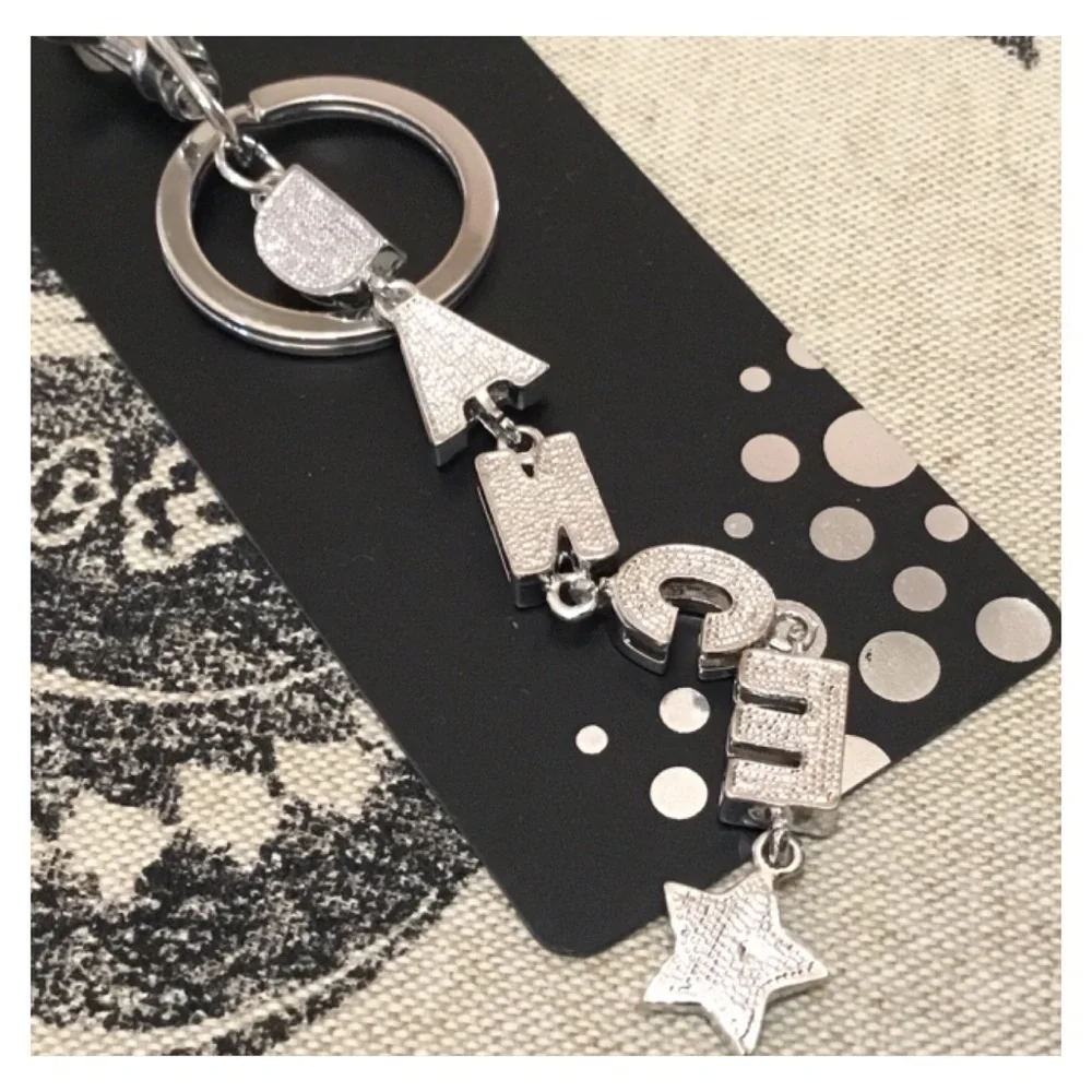 New! Silver Rhinestone “DANCE’ Keychain on Display